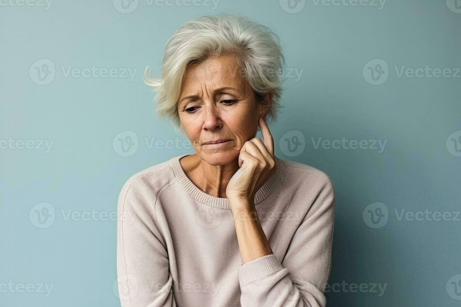 Patient showing signs of despair in a hospital room isolated on a gradient background photo