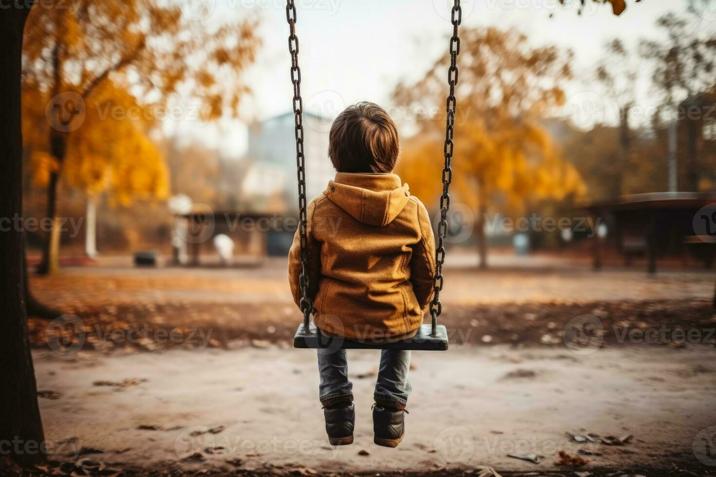 Child alone on playground swing background with empty space for text photo