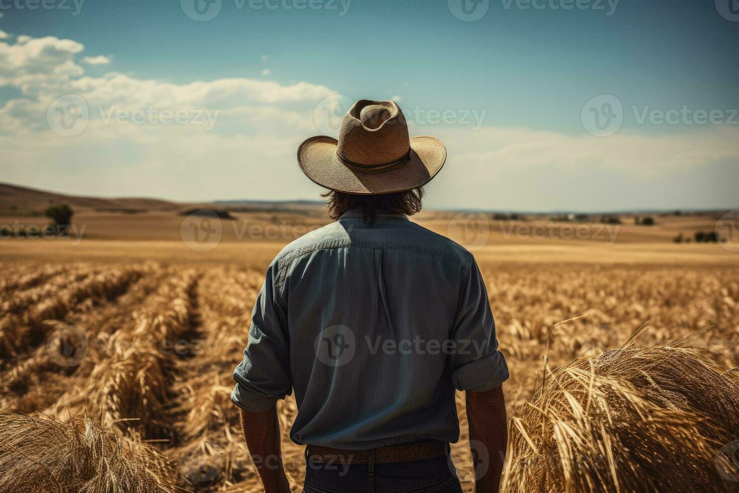 Distressed farmer in barren field background with empty space for text photo