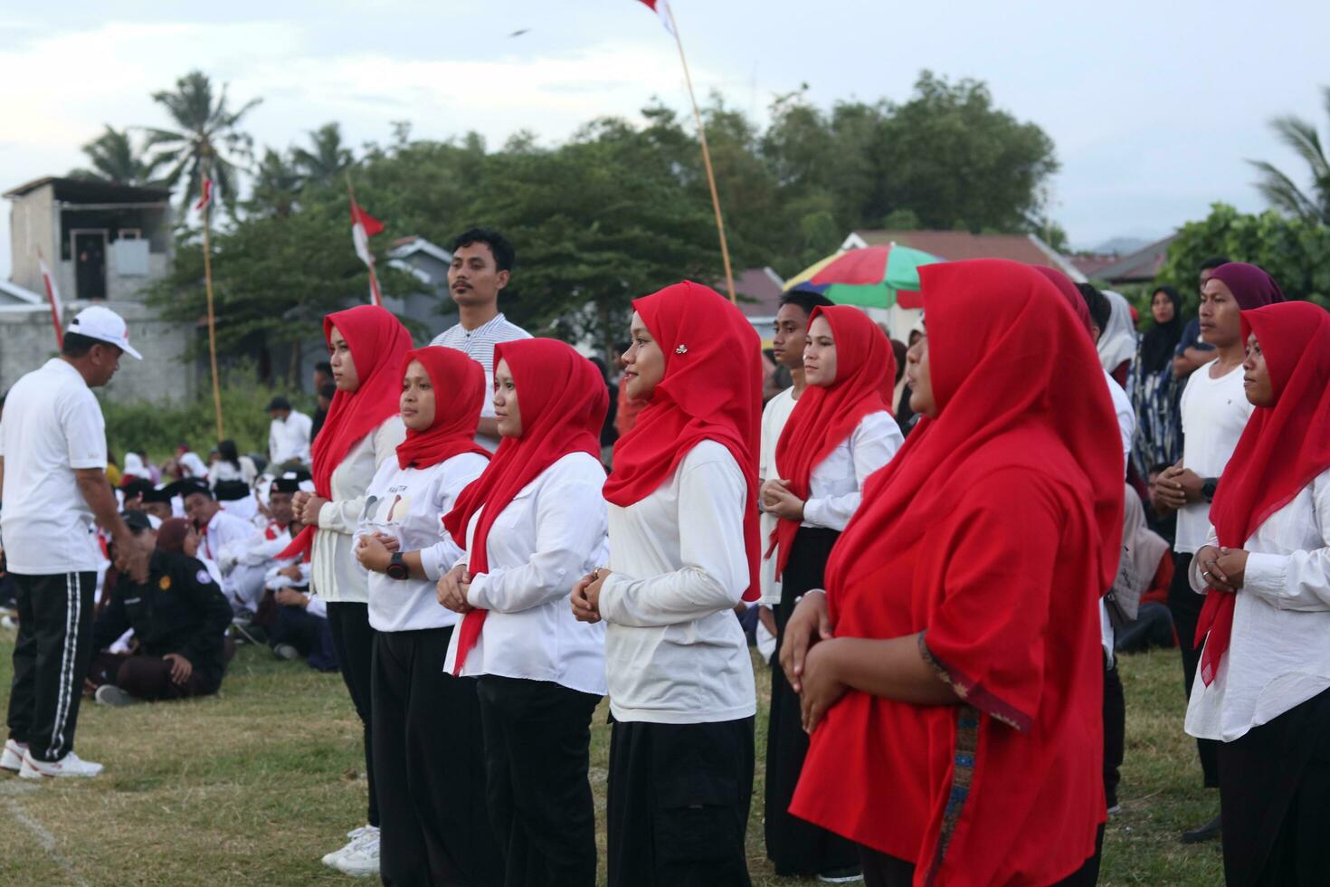 Gorontalo, Indonesia - August 17, 2023 - A group of hearing-impaired individuals becomes a choir guide group during the commemoration of Indonesia's 78th Independence Day photo