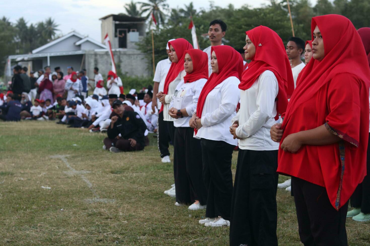 Gorontalo, Indonesia - August 17, 2023 - A group of hearing-impaired individuals becomes a choir guide group during the commemoration of Indonesia's 78th Independence Day photo