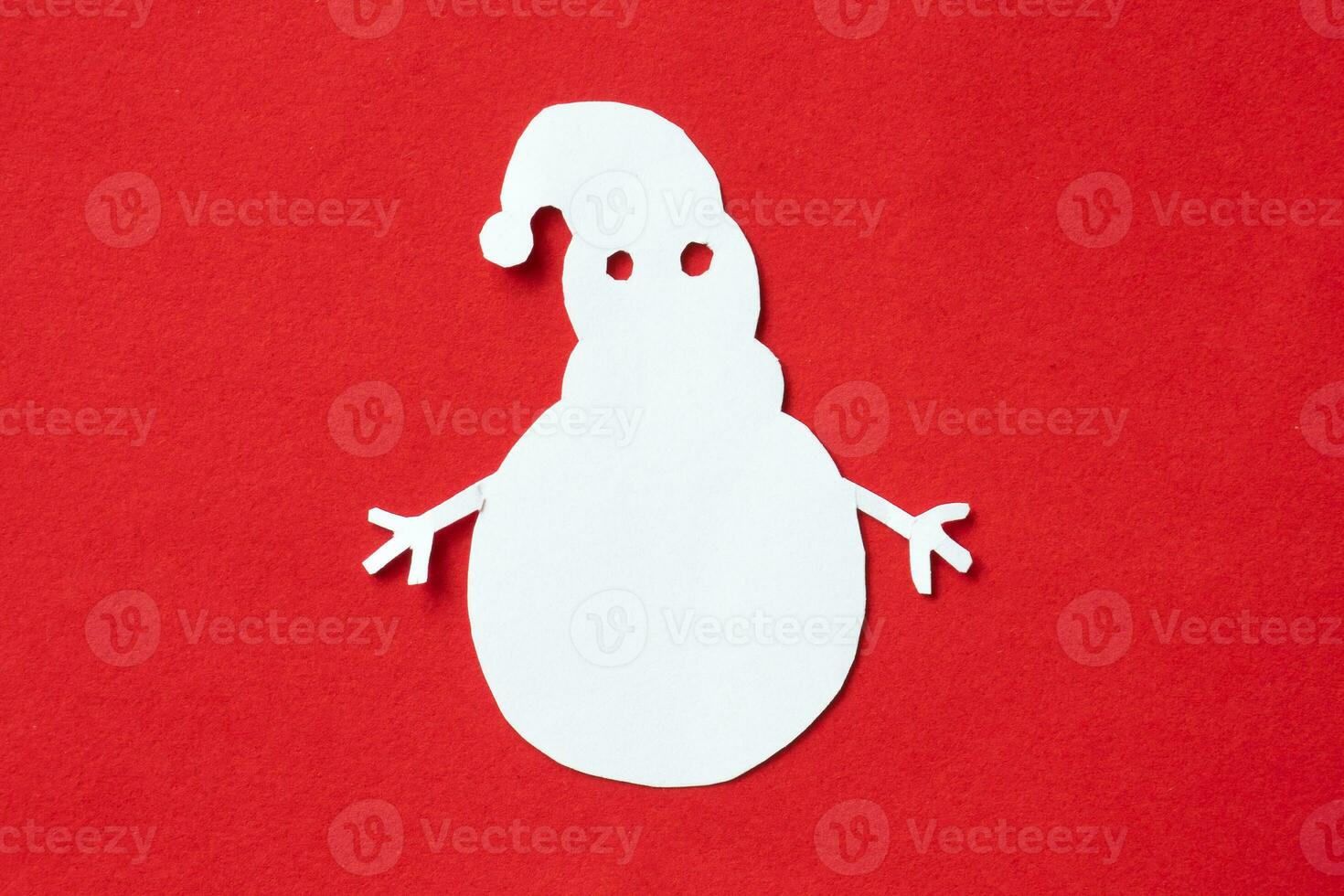 snowman paper cut on red background photo