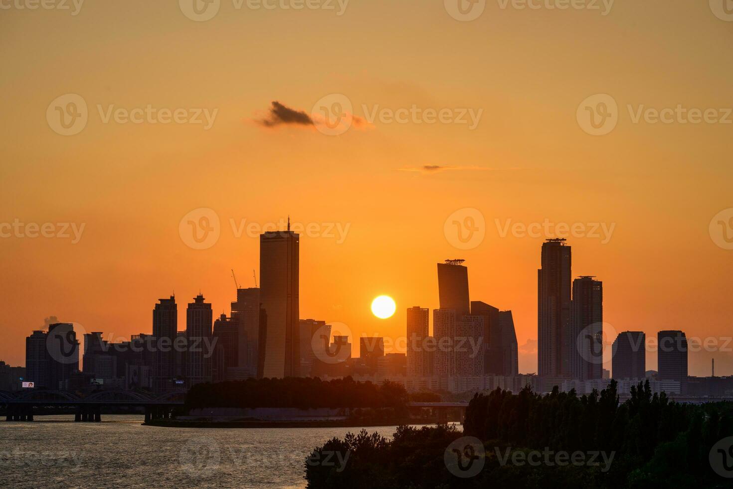 The night view of the city of Yeouido, a high-rise building, shot at Dongjak Bridge in Seoul at sunset photo