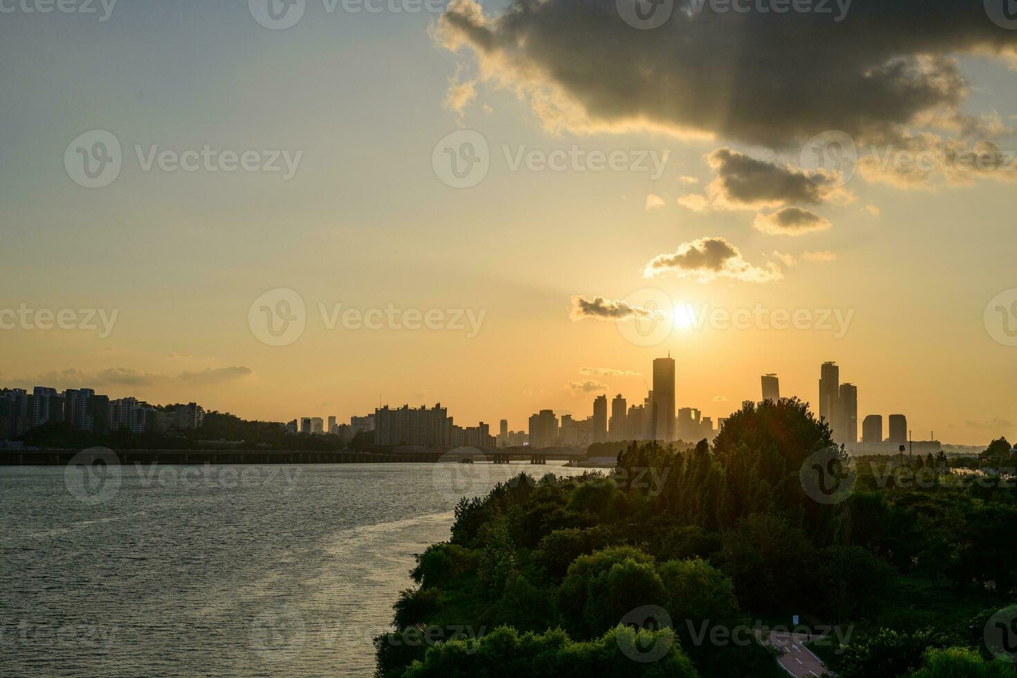 The night view of the city of Yeouido, a high-rise building, shot at Dongjak Bridge in Seoul at sunset photo