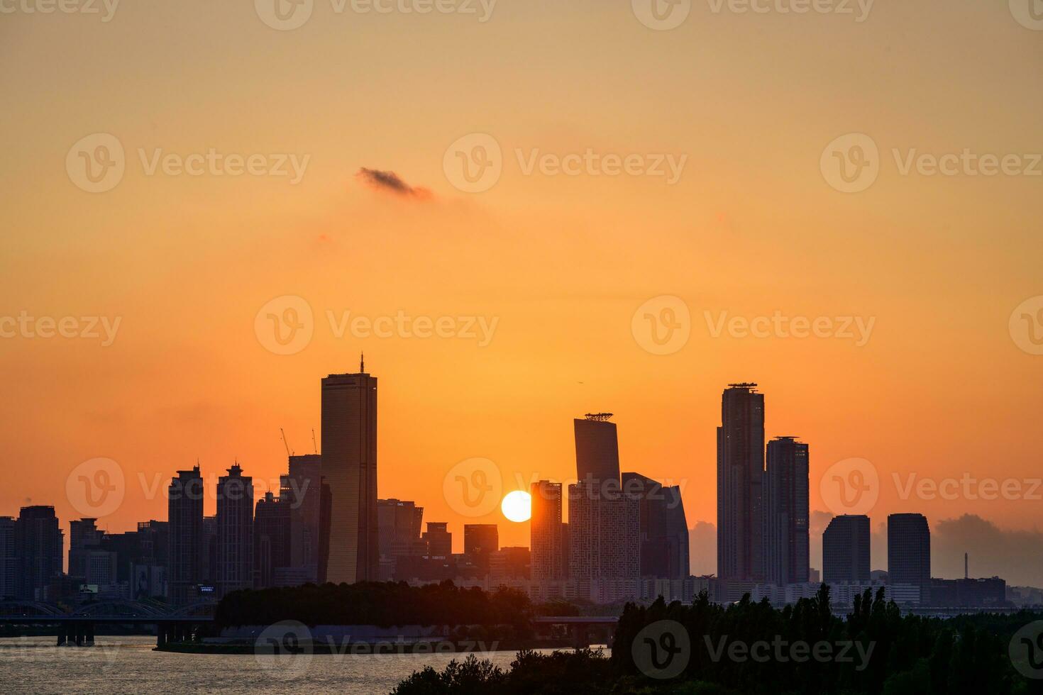 The night view of the city of Yeouido, a high-rise building, shot at Dongjak Bridge in Seoul at sunset photo