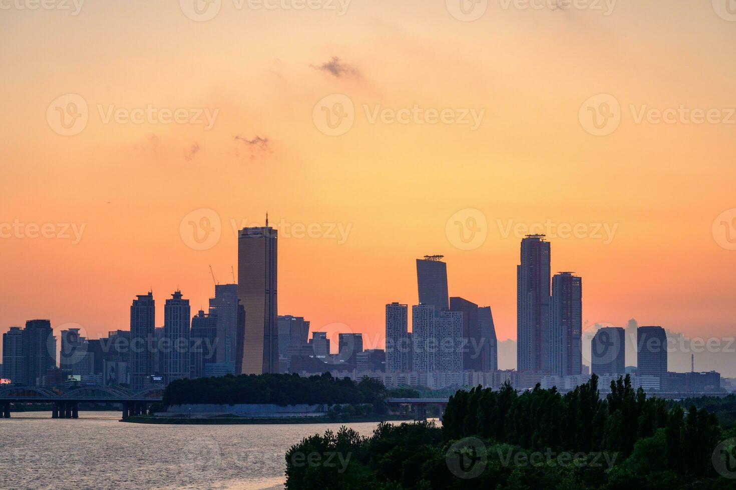 The night view of the city of Yeouido, a high-rise building, shot at Dongjak Bridge in Seoul at sunset photo