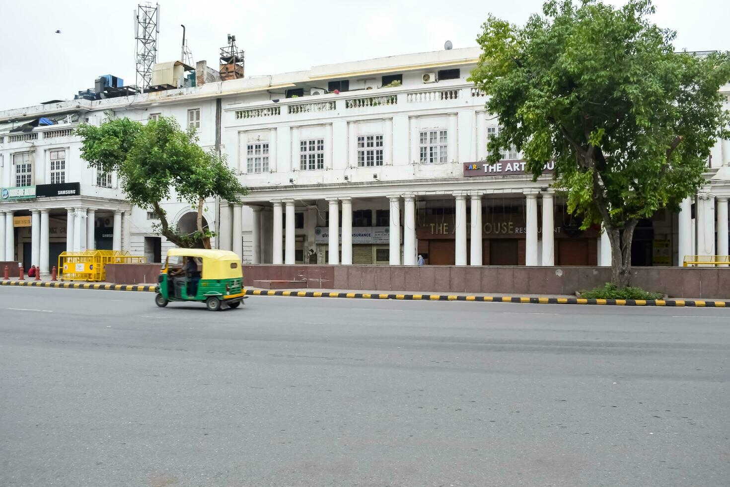 Delhi, India, March 31 2023 - Famous business district Connaught Place know as CP Delhi in the centre of New Delhi India with Offices, Banks and Shopping. British style architecture CP in Delhi, India photo