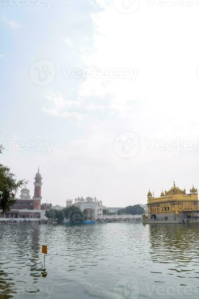 Beautiful view of Golden Temple - Harmandir Sahib in Amritsar, Punjab, India, Famous indian sikh landmark, Golden Temple, the main sanctuary of Sikhs in Amritsar, India photo