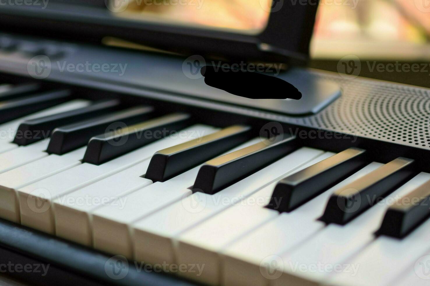 Close-up of piano keys. Piano black and white keys and Piano keyboard musical instrument placed at the home balcony during sunny day. photo