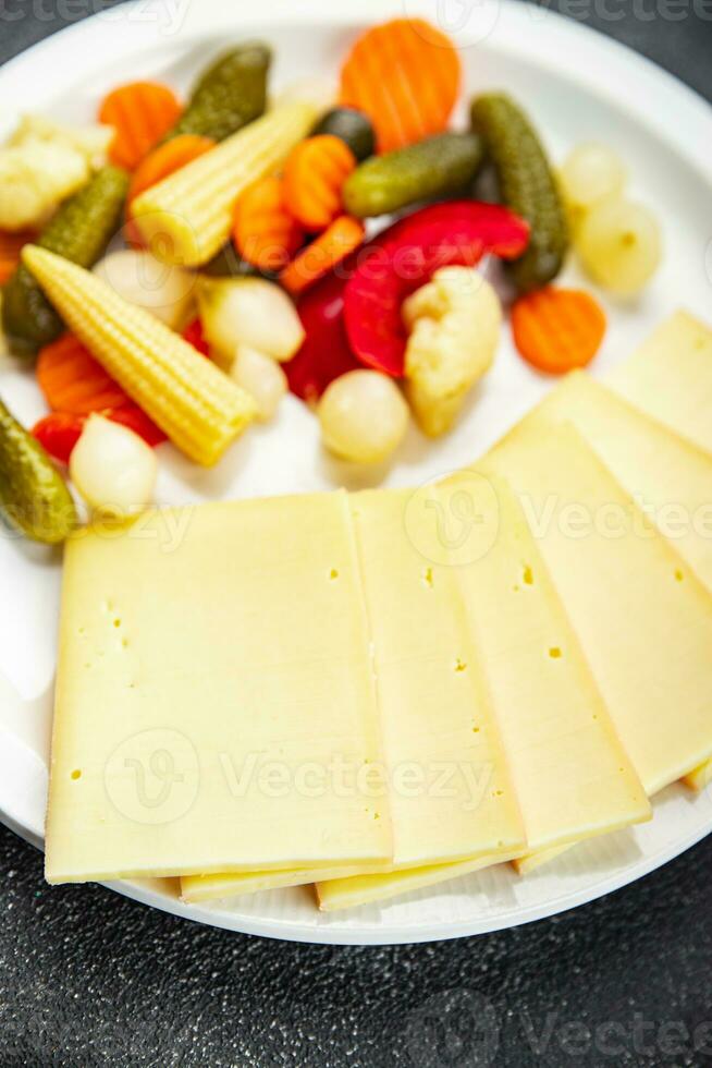 raclette cheese meal vegetable eating cooking meal food snack on the table copy space food background rustic top view photo