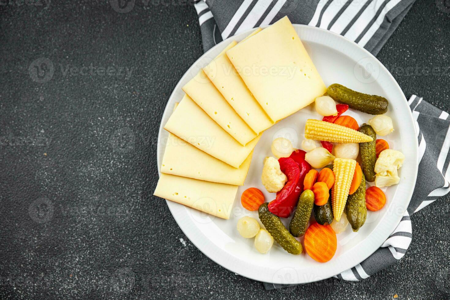 raclette cheese meal vegetable eating cooking meal food snack on the table copy space food background rustic top view photo