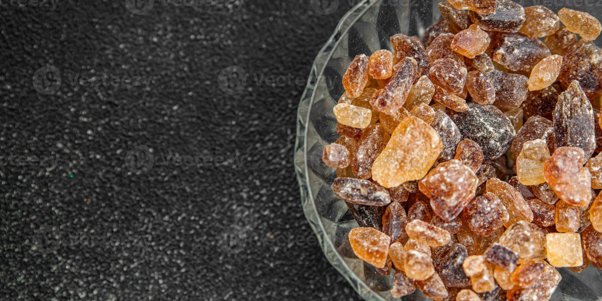 dessert rock sugar crystals pieces sweet candy brown sugar candied big rock caramel taste cane sugar cooking appetizer meal food snack on the table copy space food background rustic top view photo
