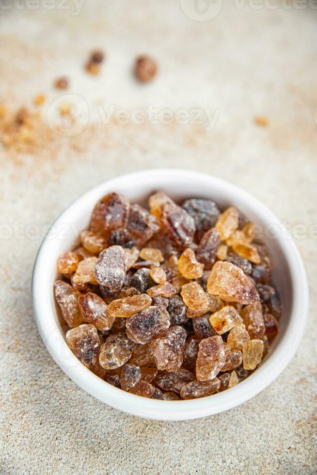 dessert rock sugar crystals pieces sweet candy brown sugar candied big rock caramel taste cane sugar cooking appetizer meal food snack on the table copy space food background rustic top view photo