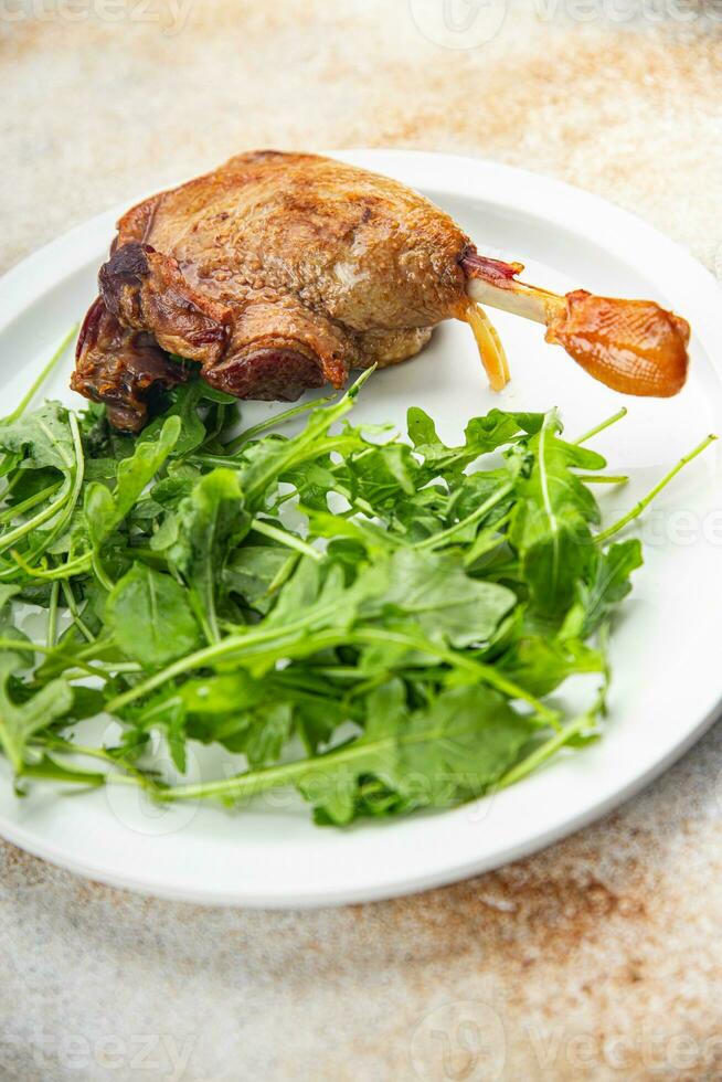 duck leg confit berry sauce poultry meat eating cooking meal food snack on the table copy space food background rustic top view photo