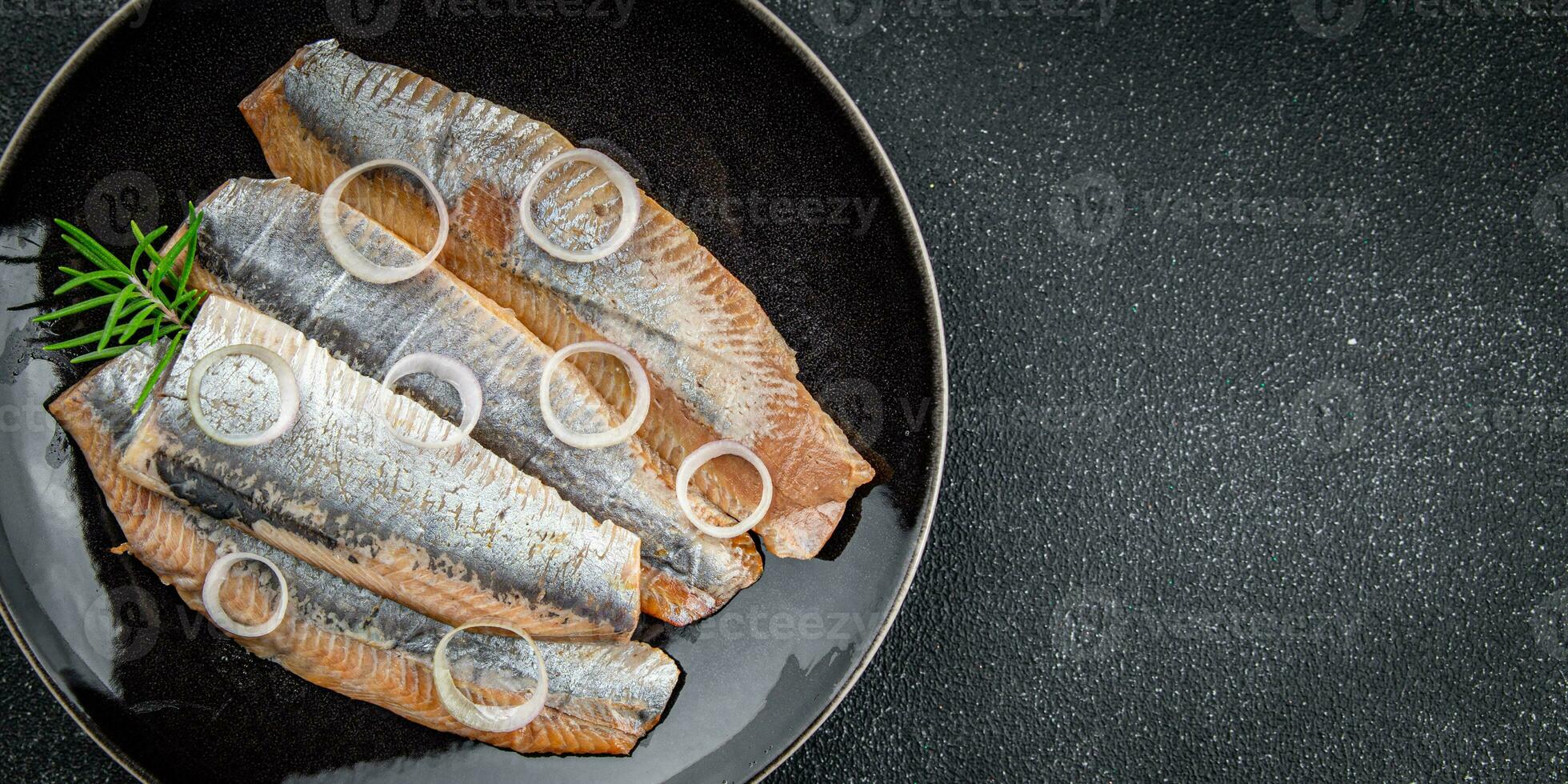 herring fillet fish fresh salted tasty seafood eating cooking meal food snack on the table copy space food background rustic top view photo