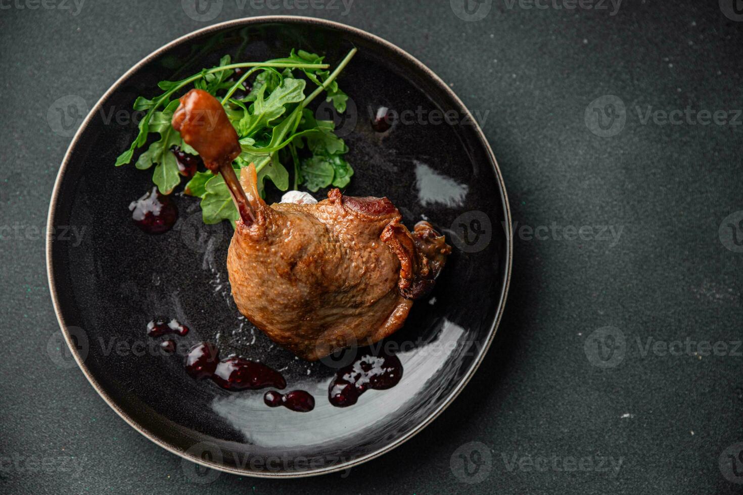 fresh duck leg confit berry sauce poultry meat eating cooking appetizer meal food snack on the table copy space food background rustic top view photo