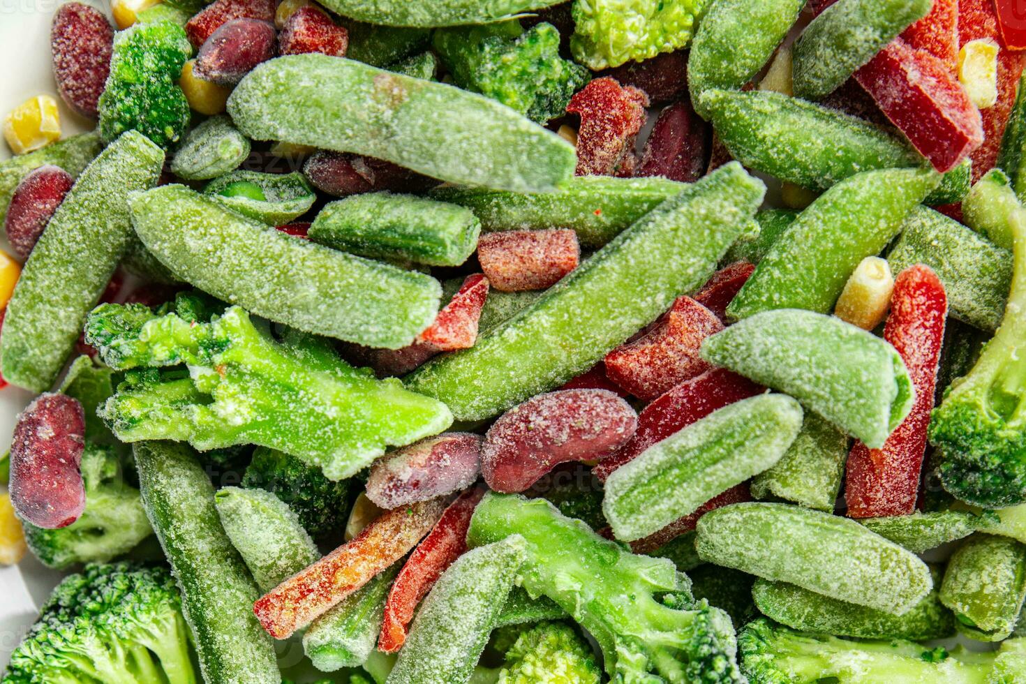 frozen vegetables mix broccoli, corn, carrots, green peas, green beans, bell peppers, beans fresh delicious healthy eating cooking appetizer meal food snack on the table photo