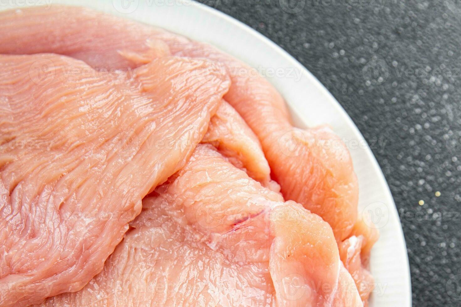 raw turkey meat fillet slice fresh poultry meat healthy eating cooking meal food snack on the table copy space food background rustic top view photo