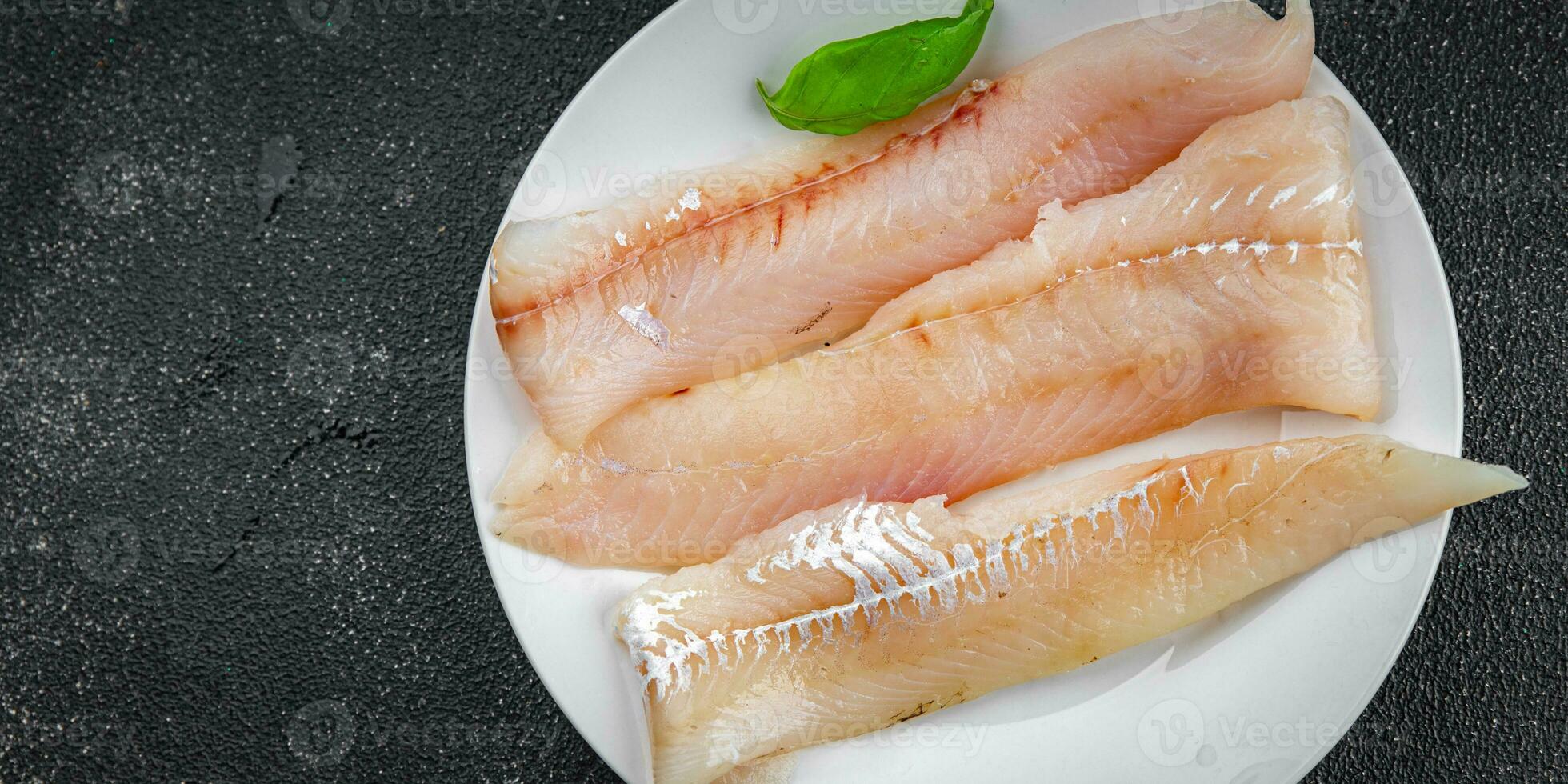 fish fish fillet blue whiting fresh seafood eating cooking appetizer meal food snack on the table copy space food background rustic top view photo