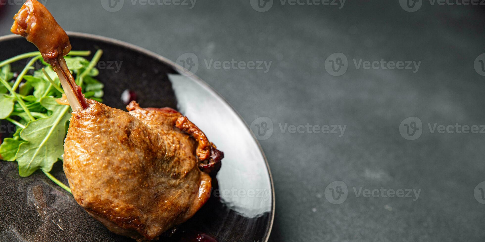 duck leg confit berry sauce poultry meat eating cooking meal food snack on the table copy space food background rustic top view photo