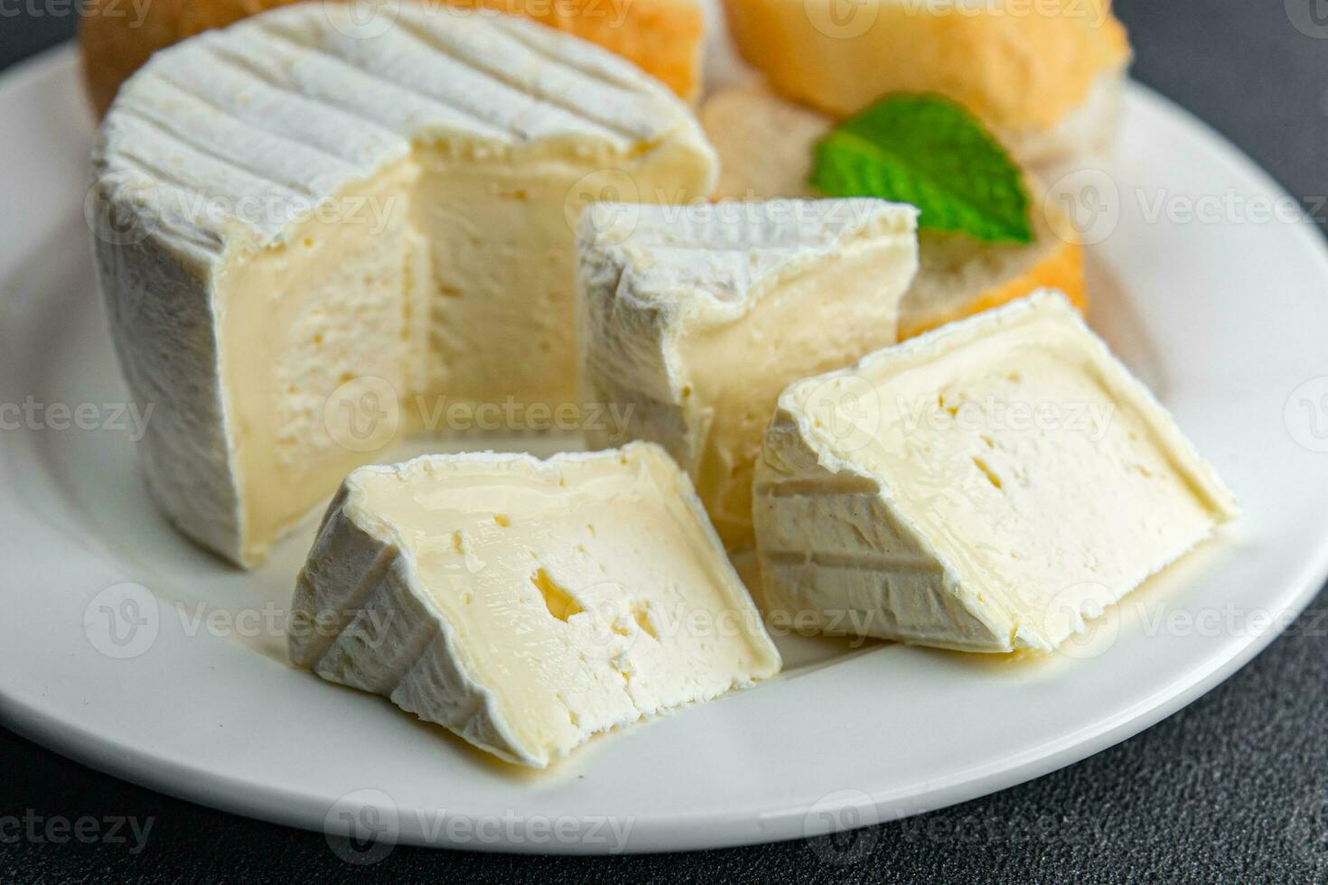 soft cheese in white mold delicious creamy taste healthy eating cooking appetizer meal food snack on the table copy space food background rustic top view photo