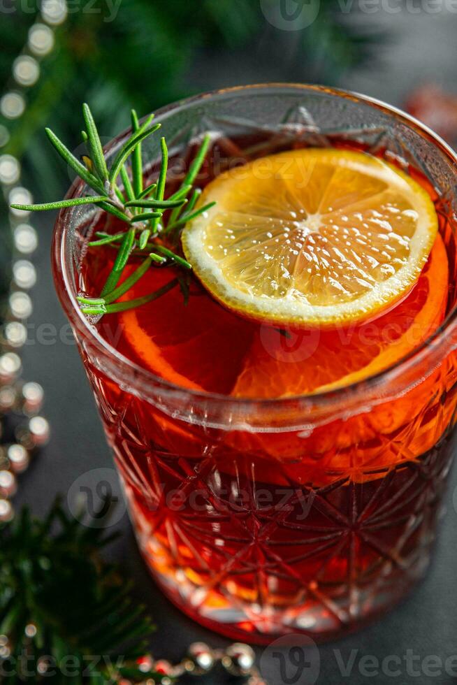 mulled wine christmas cocktail citrus rosemary drink new year holiday appetizer meal food snack on the table copy space food background rustic top view photo