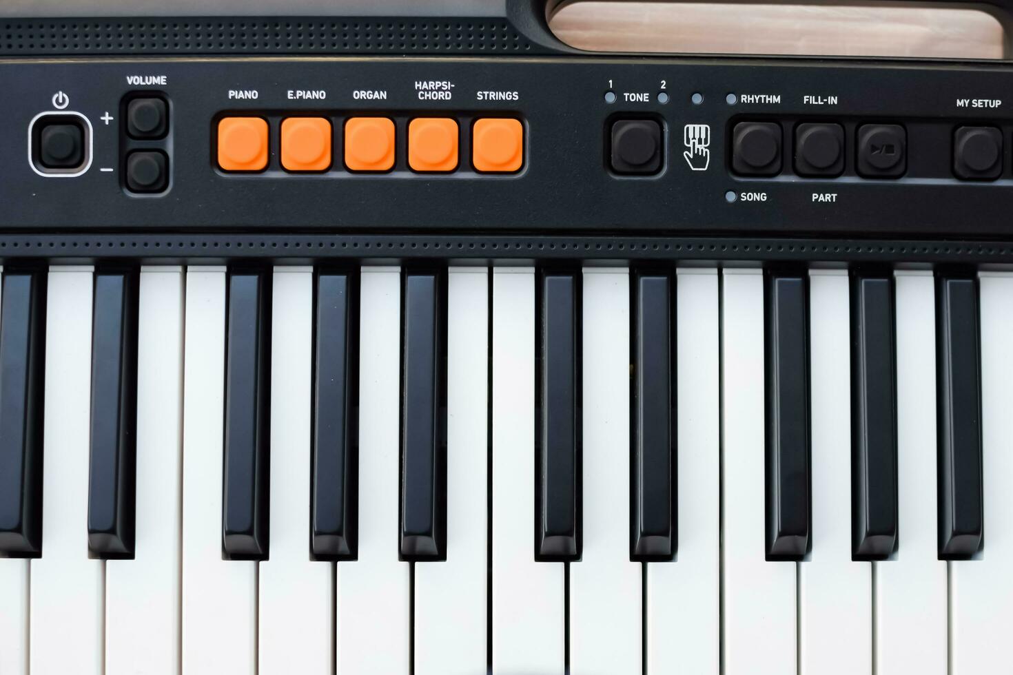 Close-up of piano keys. Piano black and white keys and Piano keyboard musical instrument placed at the home balcony during sunny day. photo