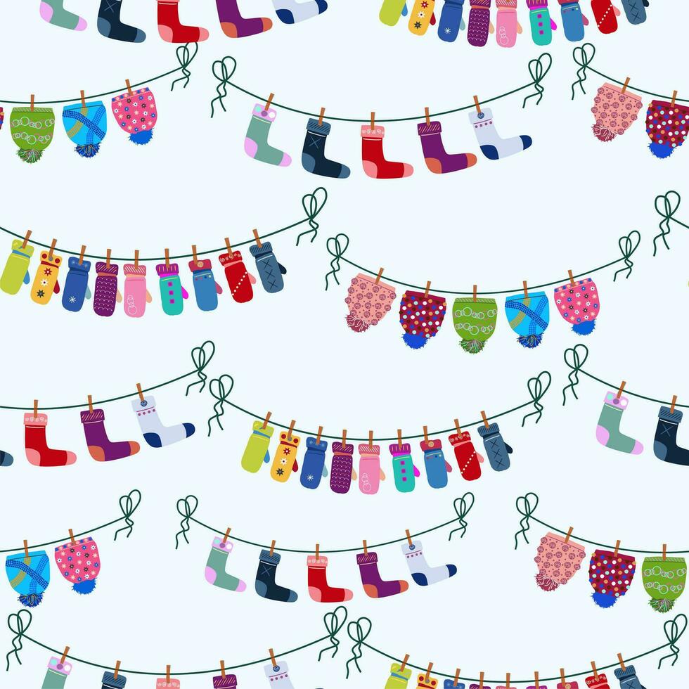 Seamless pattern with winter clothes hanging on a clothesline. Vector in cartoon style.