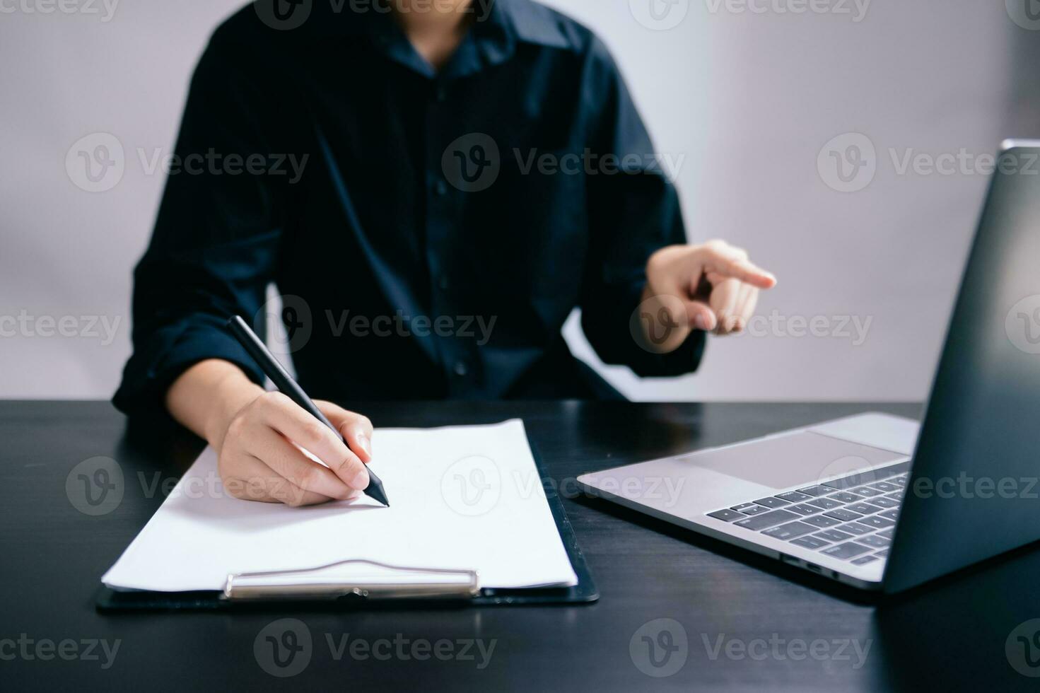 Businesswoman hand using laptop, tablet and smartphone in office. Digital marketing media mobile app and discussing plan new start up project. photo