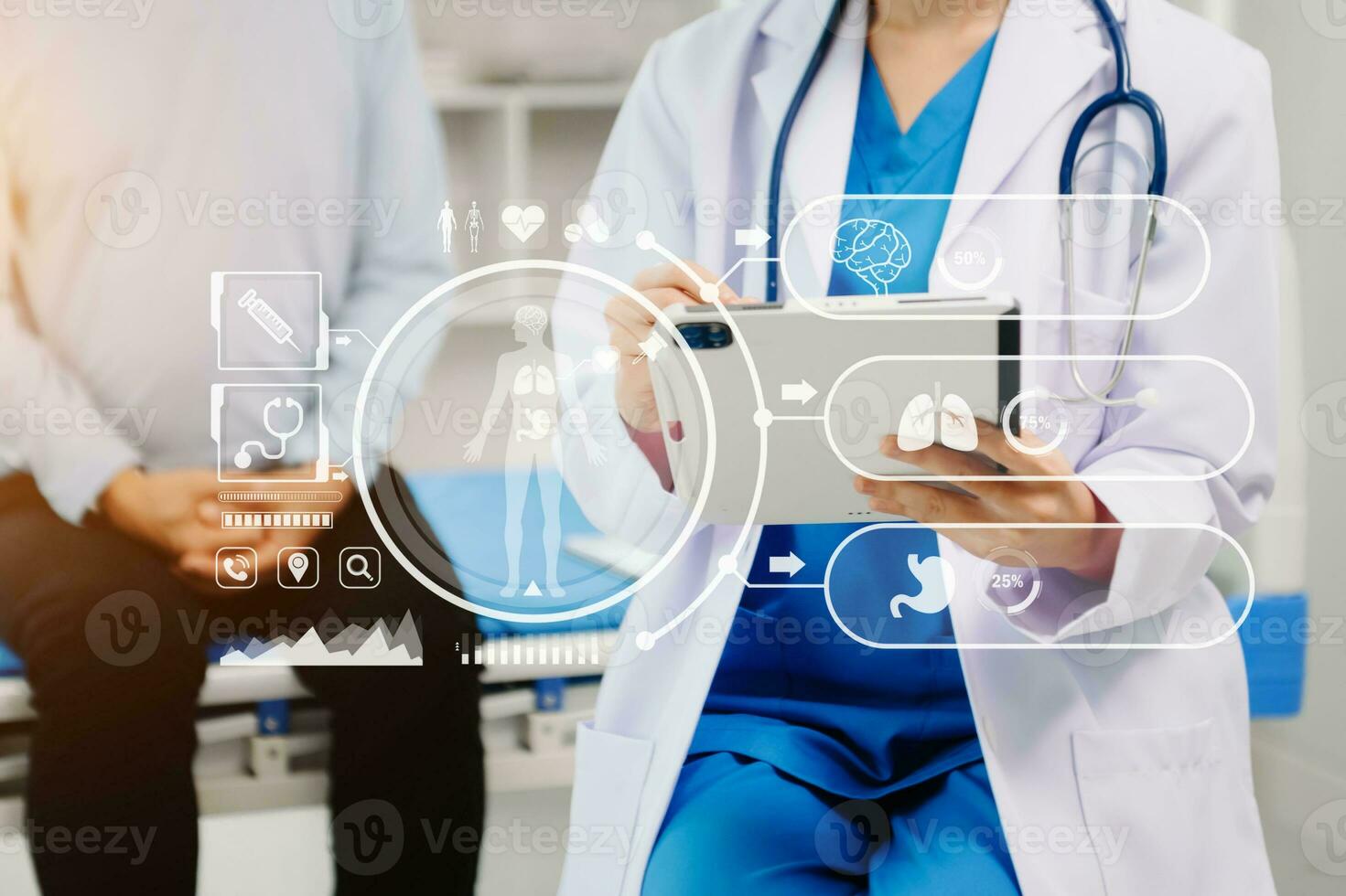 Doctor works with mobile devices on the Internet in the office. on hologram modern virtual icon photo
