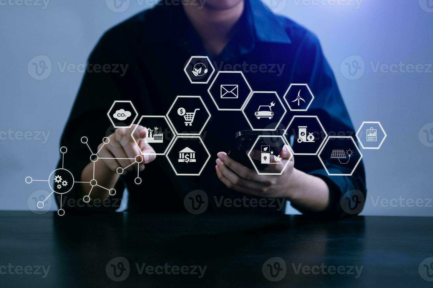 ESG concept of environmental, Green ethical business preserving resources, reducing CO2, Business person working on laptop virtual smartphone to reduce CO2 photo