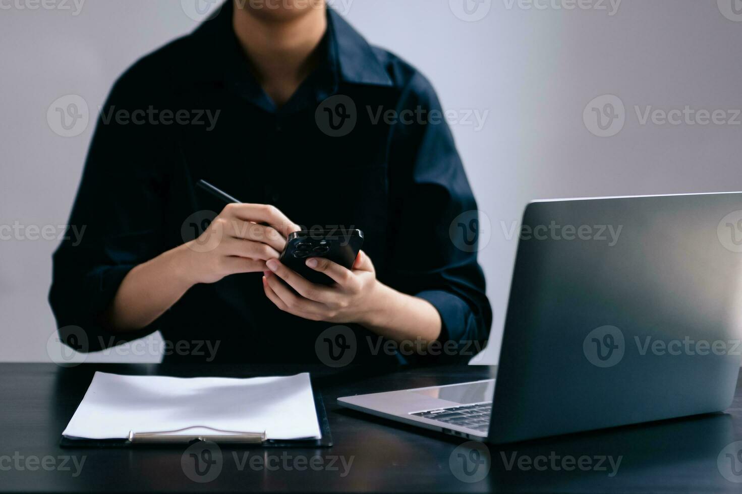 Businesswoman hand using laptop, tablet and smartphone in office. Digital marketing media mobile app and discussing plan new start up project. photo
