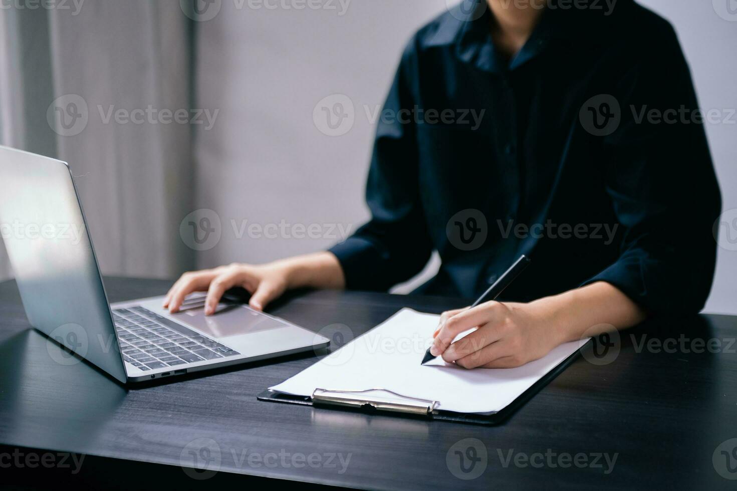Businesswoman hand using laptop, tablet and smartphone in office. Digital marketing media mobile app and discussing plan new start up project. photo