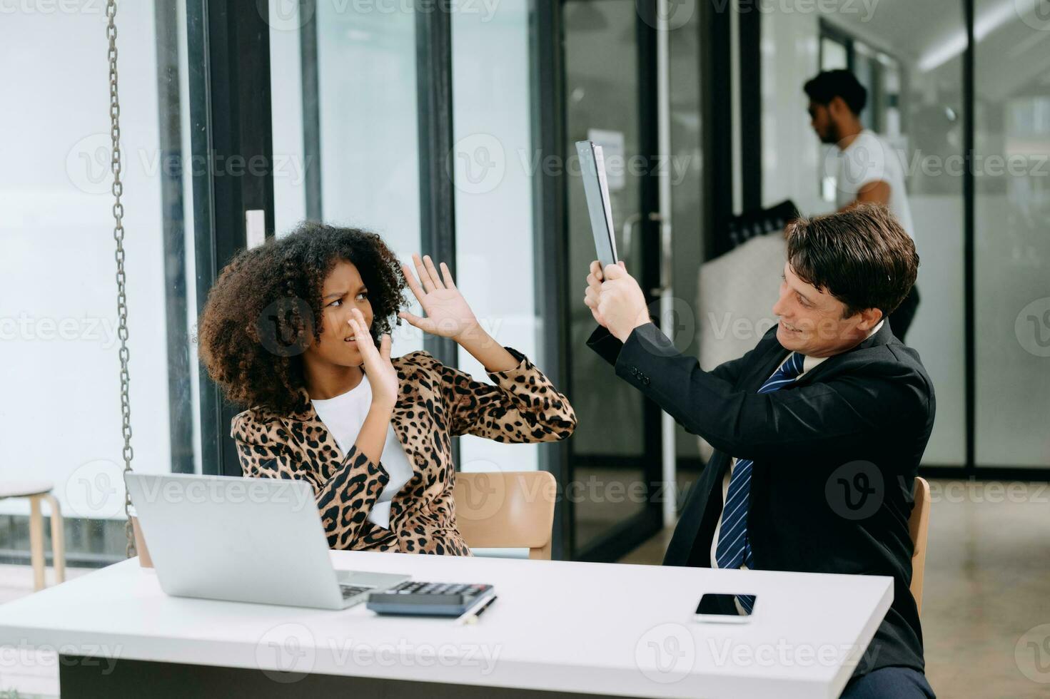 Furious two businesspeople arguing strongly after making a mistake at work  by bad news, upset colleagues in panic after company bankruptcy concept in office photo