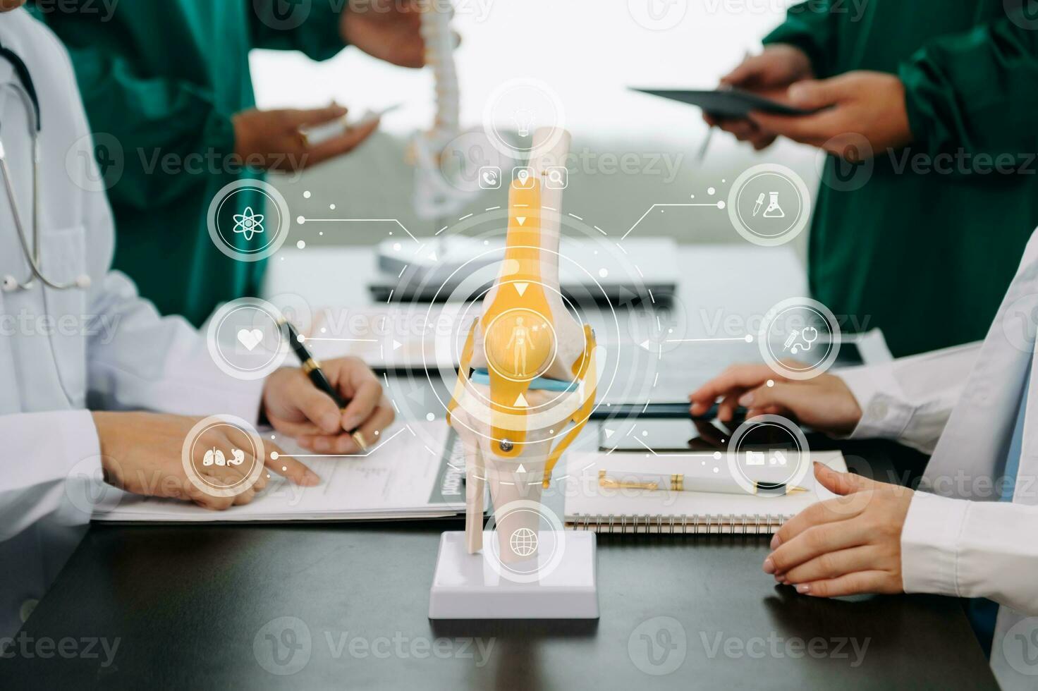 Medical technology network team meeting concept. Doctor hand working with smart phone modern digital tablet and laptop computer with graphics chart interface, with virtual icon photo