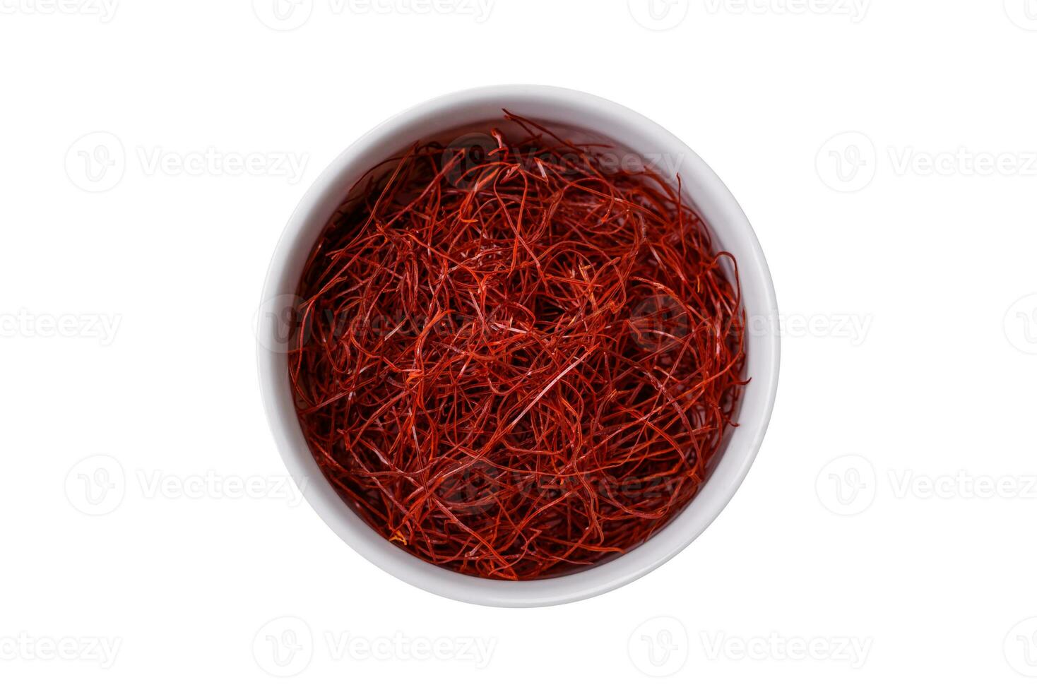Red thin hot chili threads on a dark background photo