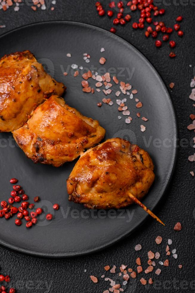 Delicious fresh chicken kebab with salt, spices and herbs photo