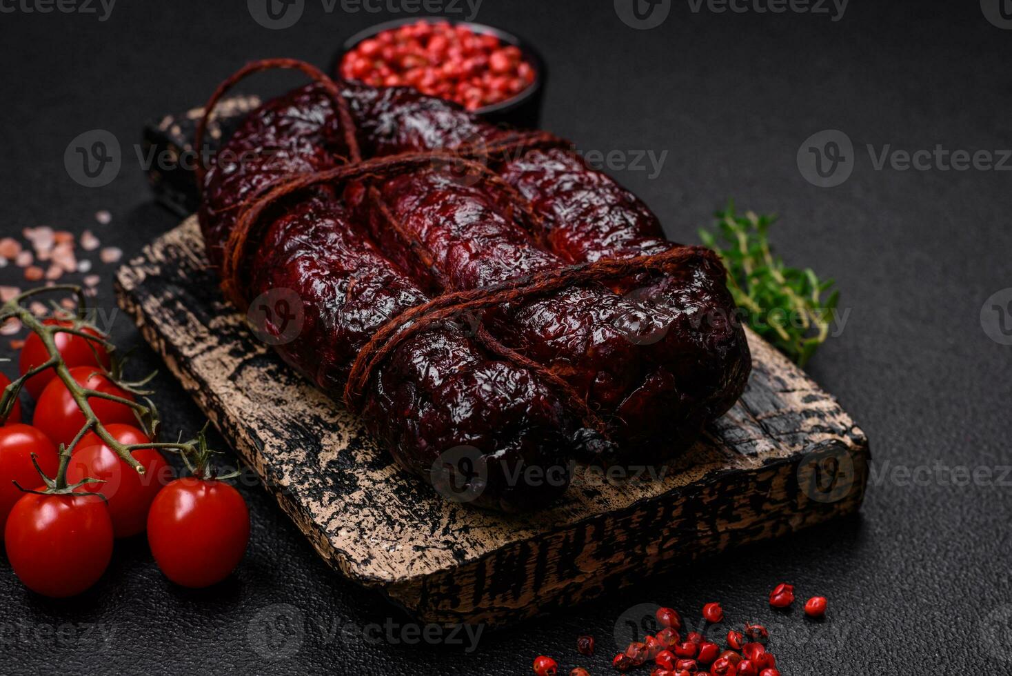 Delicious black blood sausage or black pudding with spices and herbs photo