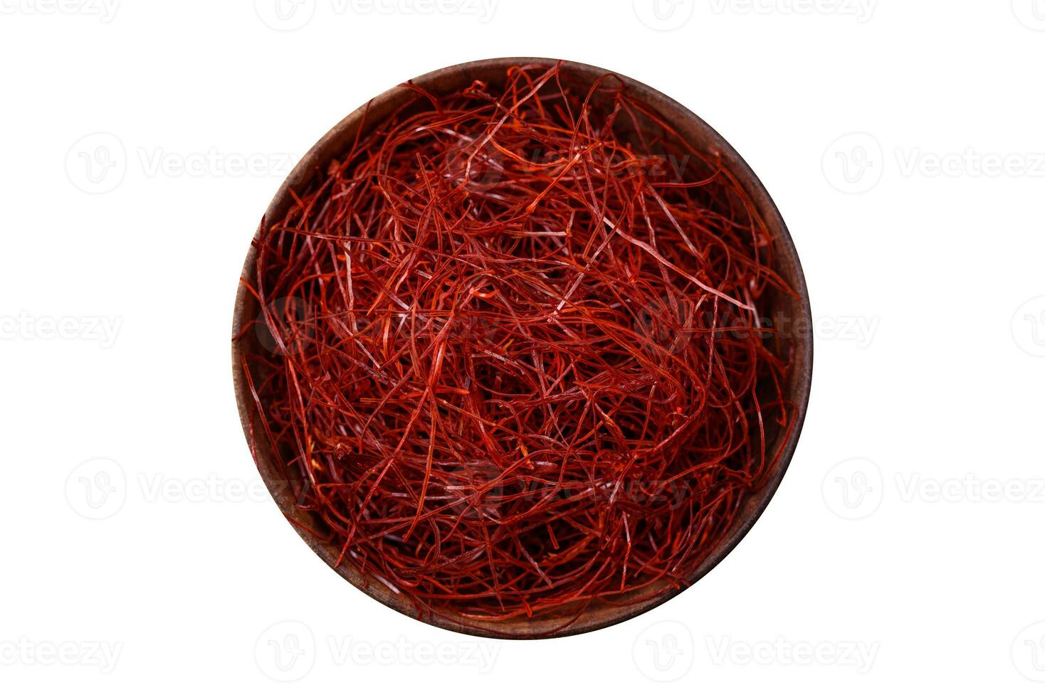 Red thin hot chili threads on a dark background photo