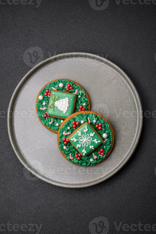 Beautiful festive Christmas gingerbread made by hand with decoration elements photo