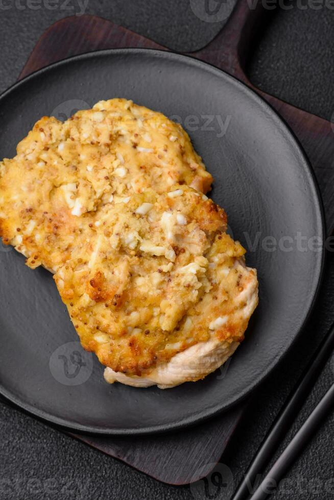 Delicious meat fried with Dijon mustard with salt, spices and herbs photo