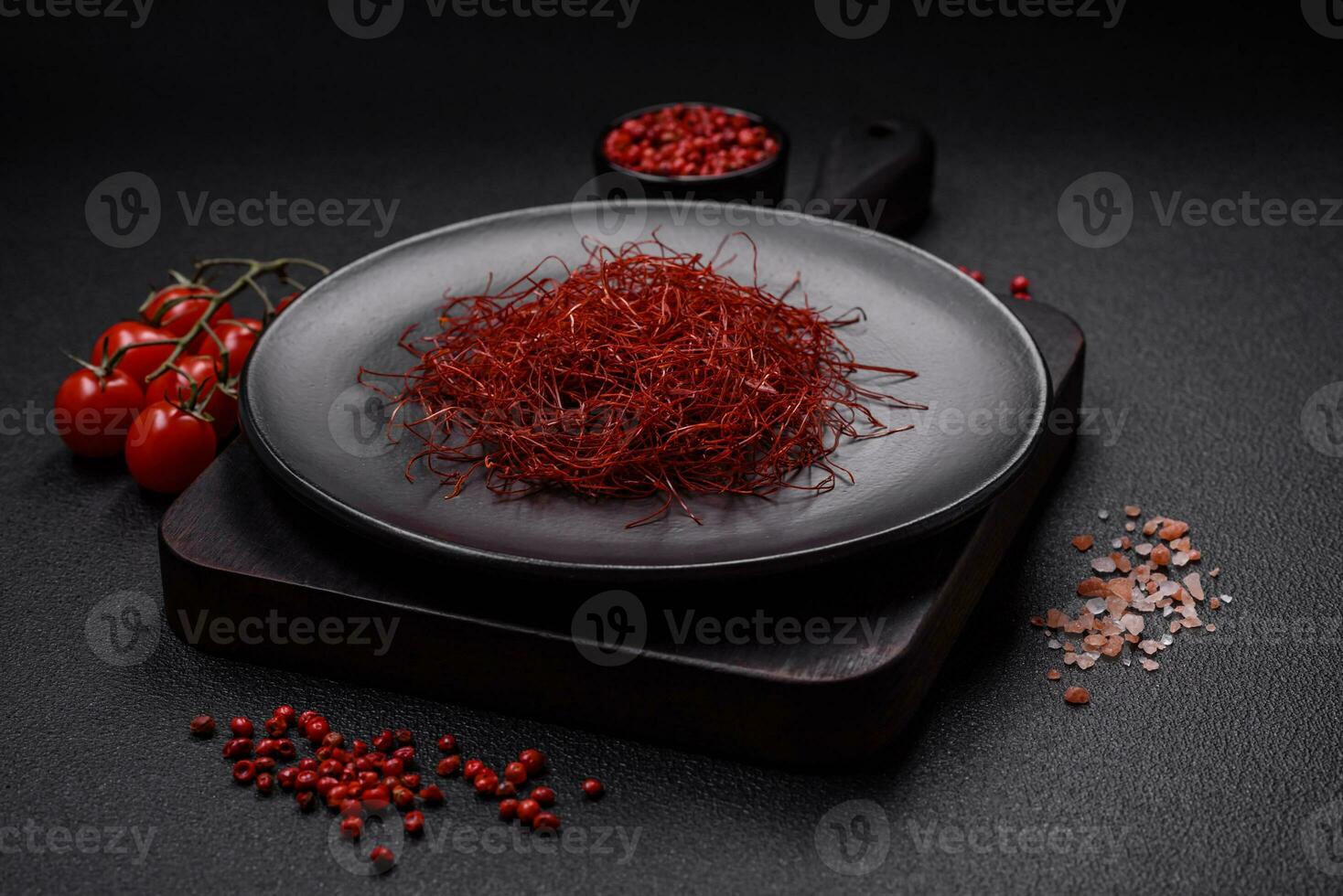 Red thin hot chili threads on a dark background photo