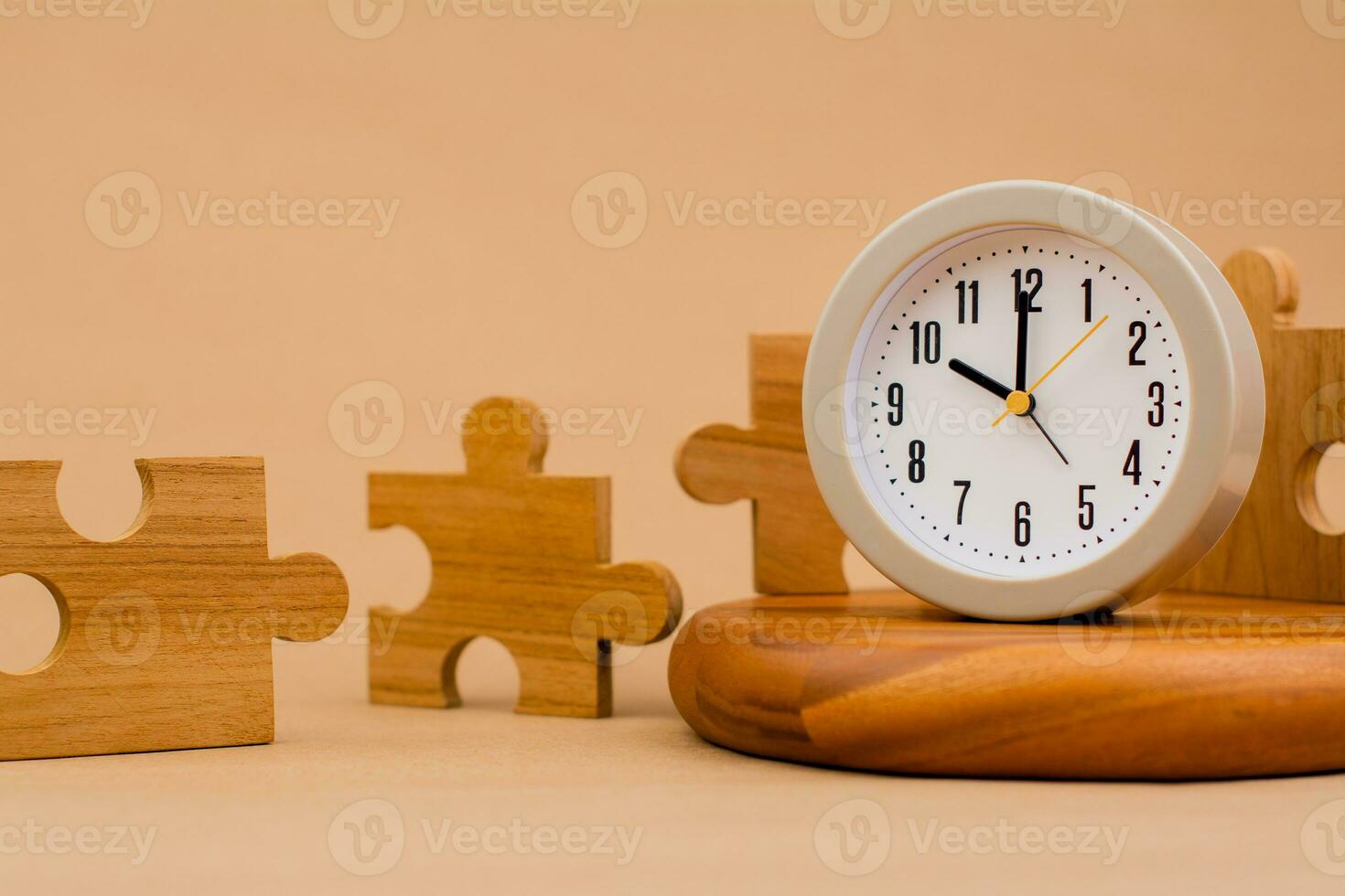 Clock and jigsaw puzzle pieces. Time lapse time. Wooden jigsaw puzzle pieces. communication teamwork key components photo