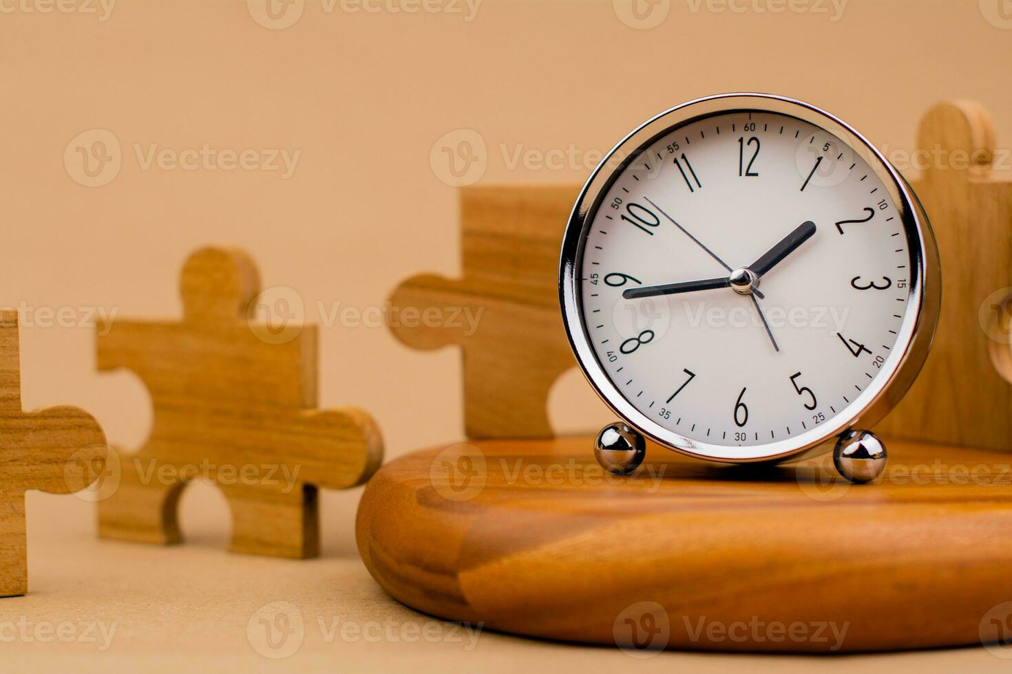 Clock and jigsaw puzzle pieces. Time lapse time. Wooden jigsaw puzzle pieces. communication teamwork key components photo