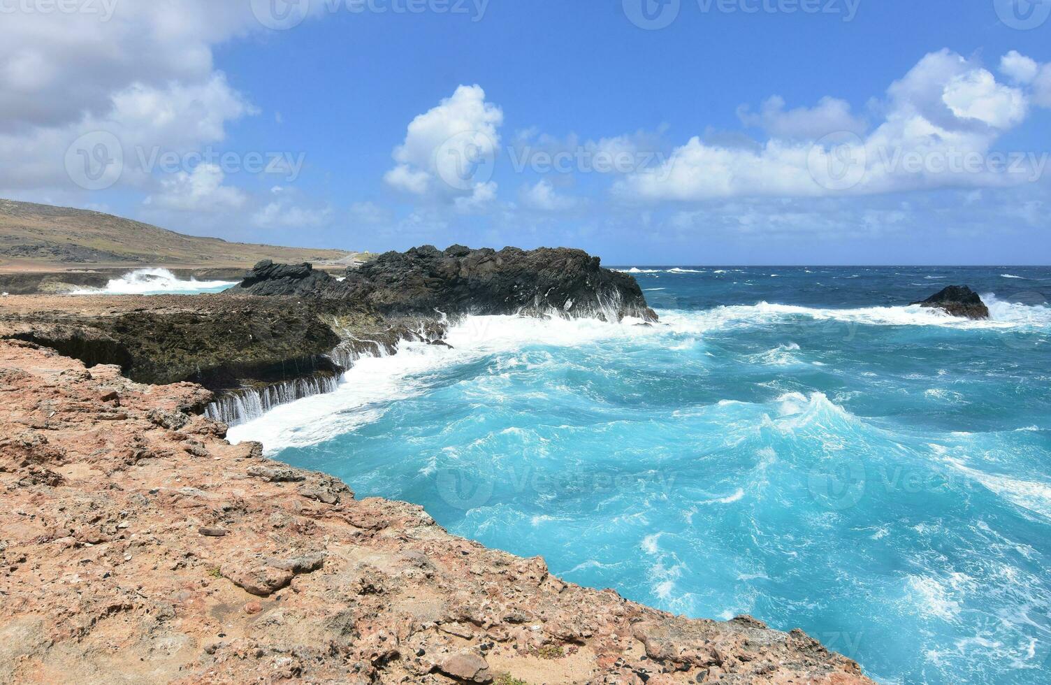 Waves Crashing on to the Bluffs By Andicuri Beach photo
