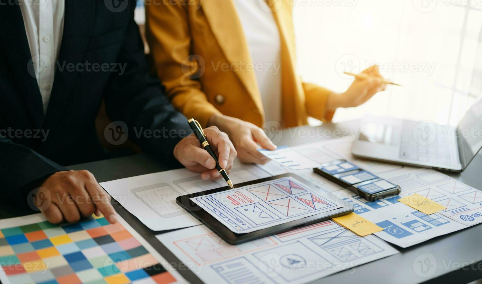 UX graphic designer planning application process development prototype wireframe for web smart phone. Creative digital development agency. photo