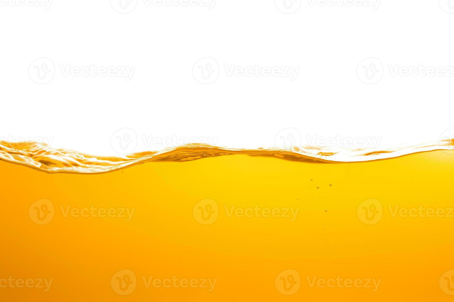 orange juice is isolated on white background. healthy fresh drink and natural waves. close up view. photo