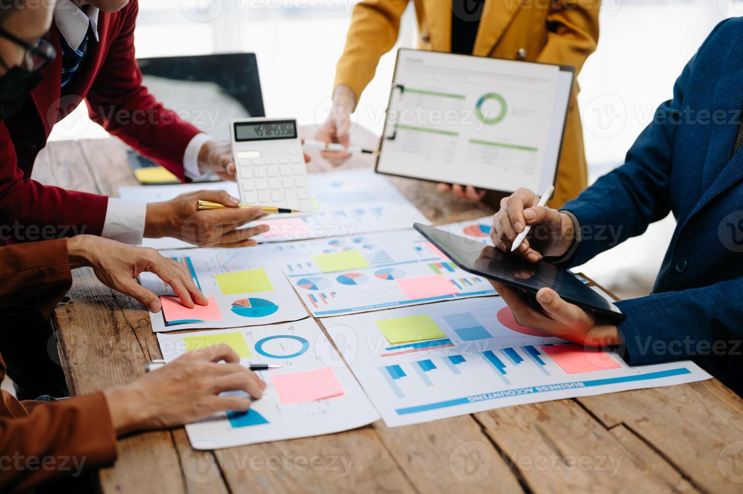 Business team meeting. professional investor working new start up project. Finance task. with smart phone and laptop and digital tablet computer photo