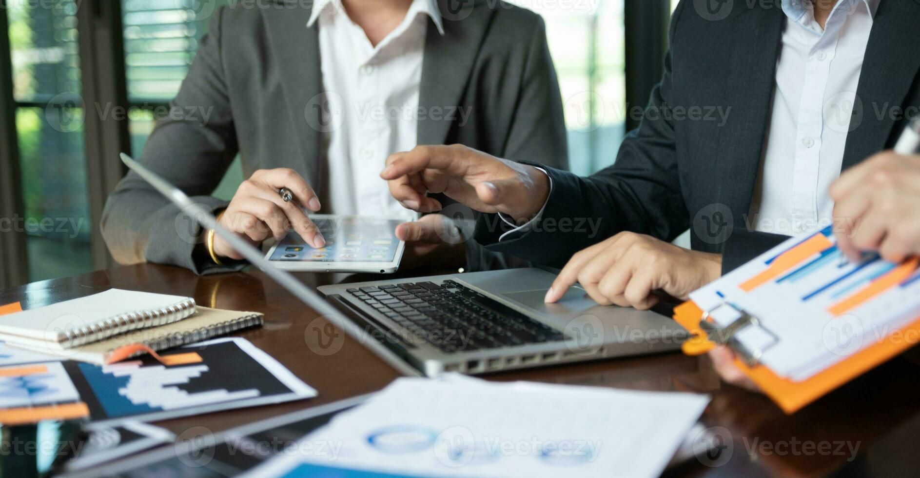 Team work process. Photo young business crew working with new startup project. Project managers meeting. Analyze plans, papers. At office