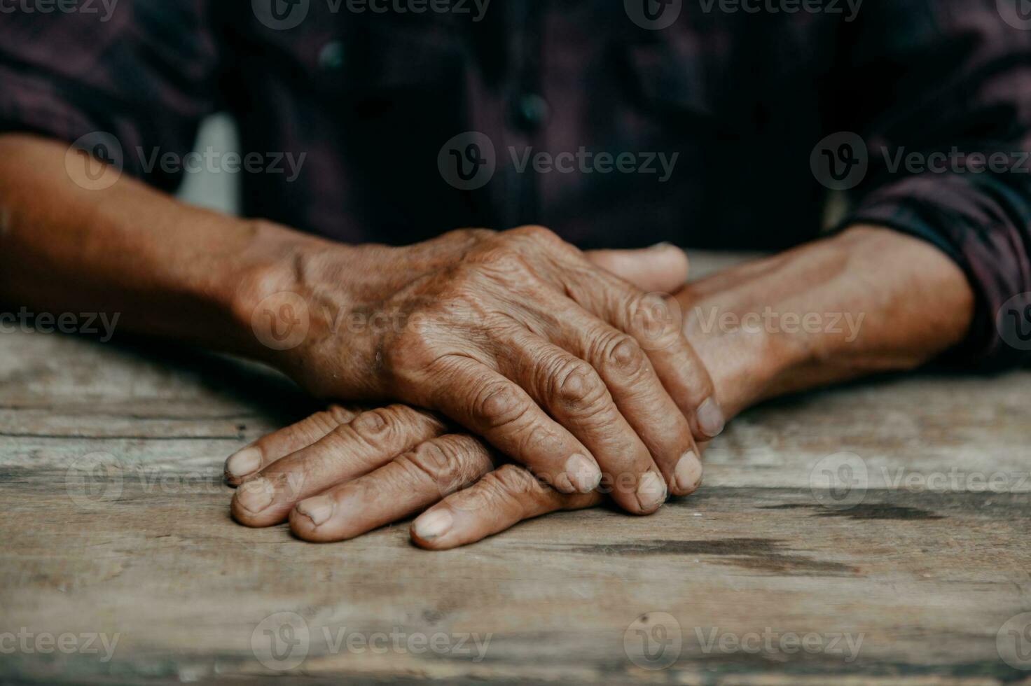 Male wrinkled hands, old man is wearing photo